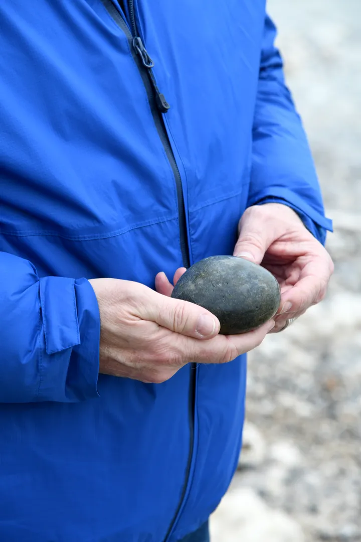 Cove Inspo - Mark Harper holding a pebble