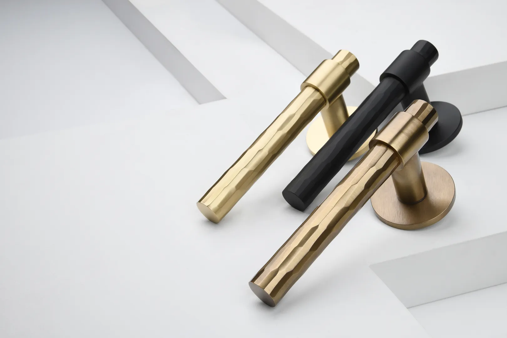 Rolled & Hammered Lever (LV1047) in ageless finishes Mid Antique Brass Ceramic - CMAB, Brushed Brass Ceramic - CBB & Soft Black Ceramic - CSB