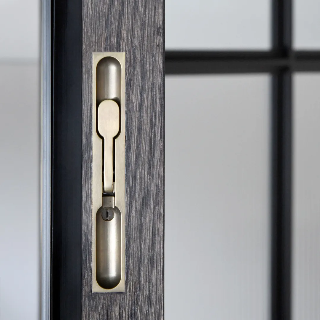 Rectangular Recessed Flush Bolt (BL1031) In Situ in Mid Antique Brass Waxed - MABW on main boardroom door