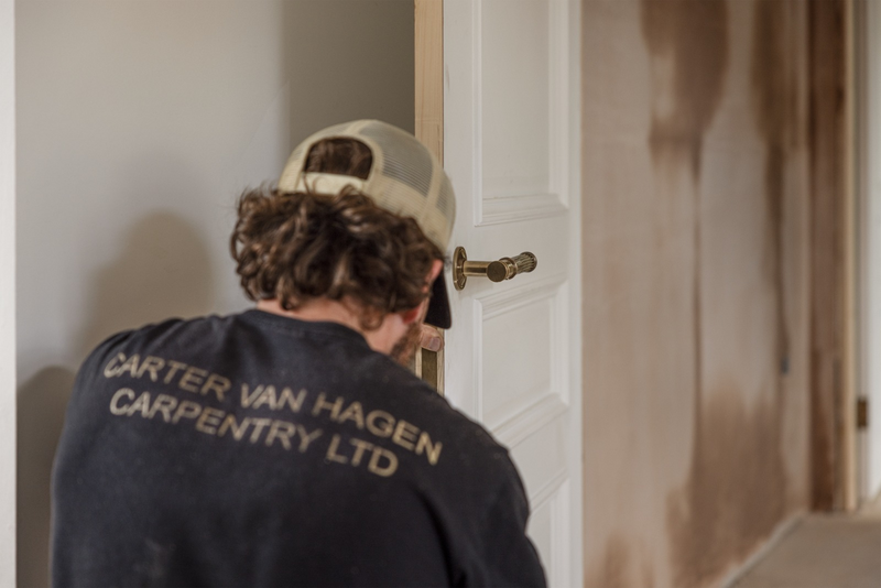 Image of the Hamilton lever (LV1990) being installed into a white door.