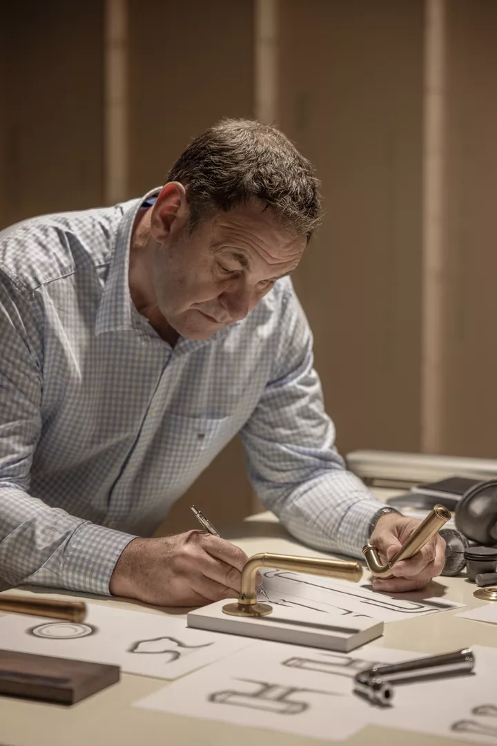 Mark Harper holding the Darlington lever handle (LV1158) and drawing.