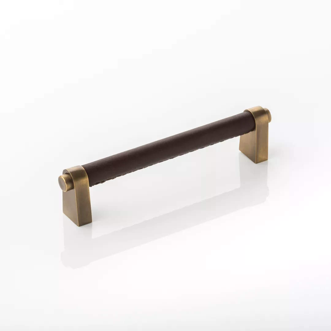 Irvine Cabinet Handle (CH1050) in Mid Antique Brass Waxed and Dark Brown Leather on a white background