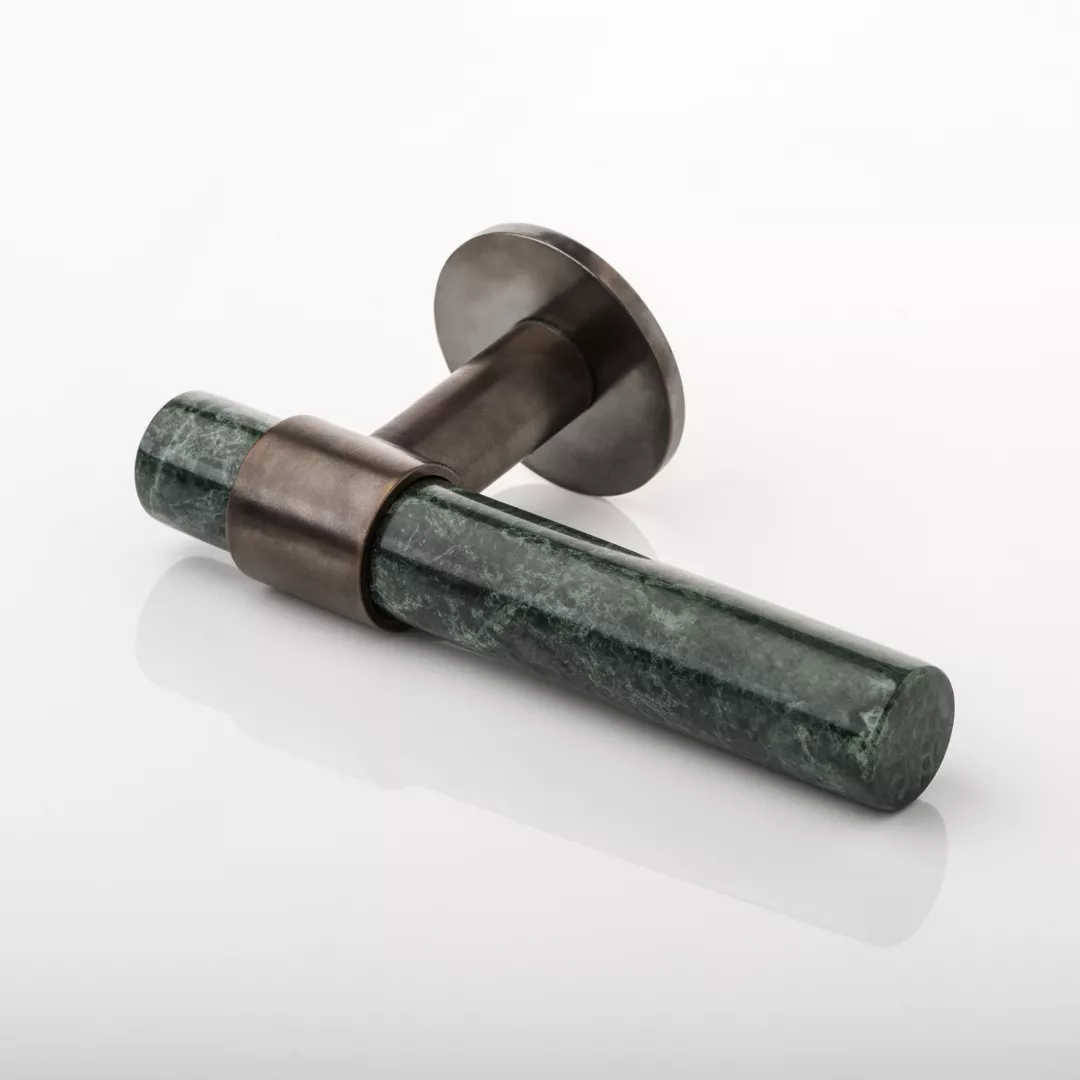 CZ Lever (LV1096) in Dark Bronze Waxed (DBZW) & Green Guatemala Marble (GGM) on a white background