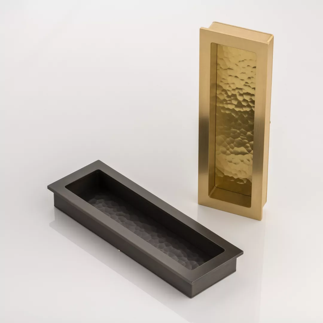 Rectangular Recessed Pull with Hammered Texture (SF1065) in Brushed Brass Waxed - BBW & Dark Bronze Waxed - DBZW on a white background.