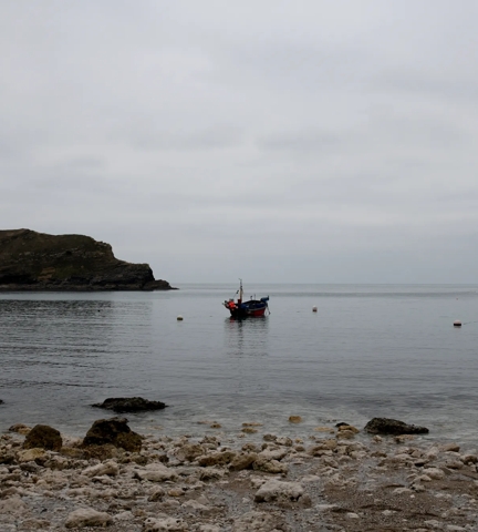Cove Inspo - Fishing boat in Lulworth Cove