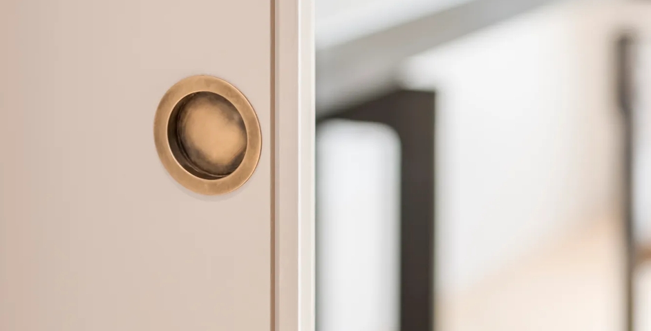 46 Brunswick Gardens - Sliding Door with Recessed Pull (SF1053) in Mid Antique Brass Waxed - MABW