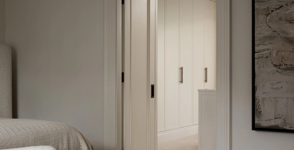 De Vere House (Victoria Road) - Bedroom & Dressing Room with Rolled & Hammered Cabinet Handles (CH1012) & Rectangular Recessed Pull (SF1049) in Mid Antique Brass Waxed - MABW