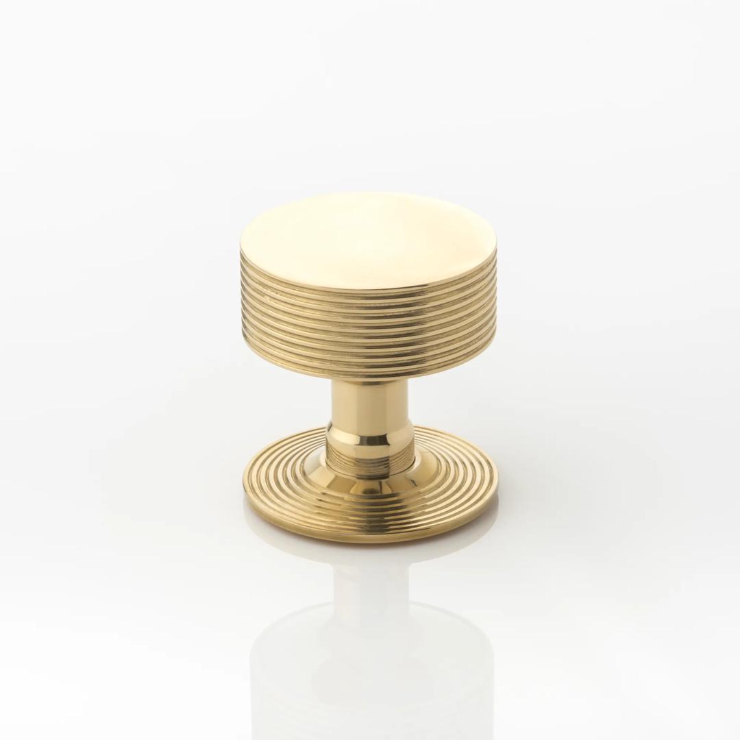 Arnett Doorknob (DK1018) Polished Brass Waxed - PBW on White.jpg