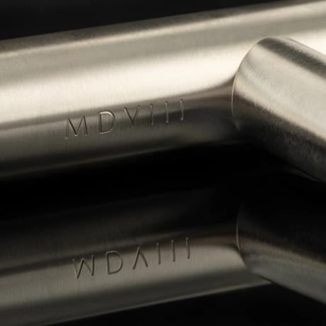 Arty Shot of Contour Lever, showing engraving on the back (LV1217, LV1219) in Brushed Nickel - BN