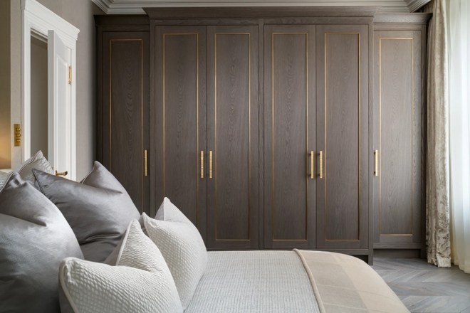 Belgravia Apartment Bedroom with Harrison Lever Handle (LV1105) and Harlyn Cabinet Handle (CH1083) in Brushed Brass Waxed - BBW