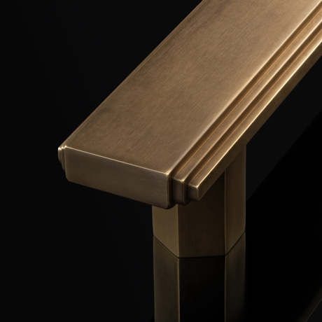 Arty Shot of Dewhurst Door Pull (DP1019) in Mid Antique Brass Waxed - MABW