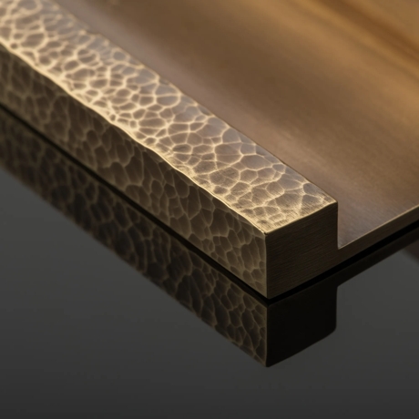 Fine Hammered Texture on a black background in Mid Antique Brass Waxed - MABW