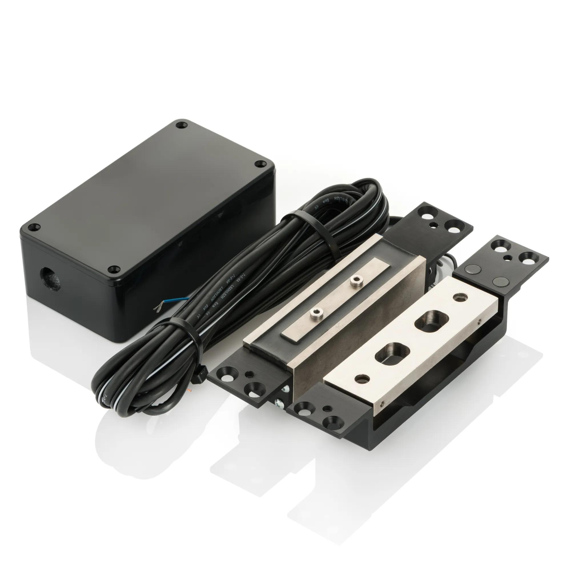 Locking shear magnet, electrically released