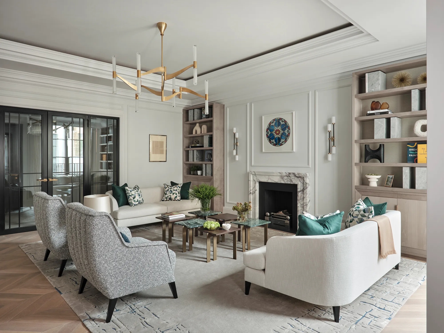 Lounge or living area in private residence, 7a Charles Street, in Mayfair designed by Taylor Howes Designs, featuring our Harrison lever handle (LV1105) in Mid Antique Brass Waxed (MABW) on a set of steel doors.