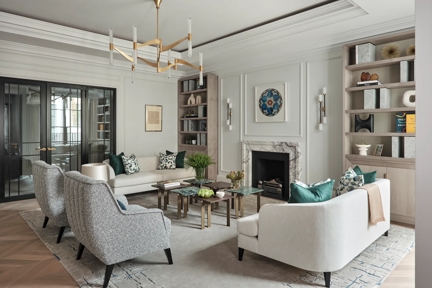 Lounge or living area in private residence, 7a Charles Street, in Mayfair designed by Taylor Howes Designs, featuring our Harrison lever handle (LV1105) in Mid Antique Brass Waxed (MABW) on a set of steel doors.