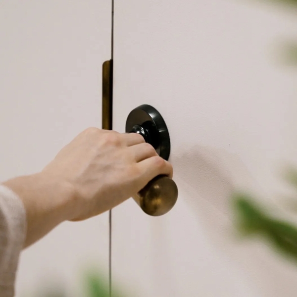 Opening door with Levant Lever (LV1222) in Dark Bronze Waxed - DBZW & Mid Antique Brass Waxed - MABW