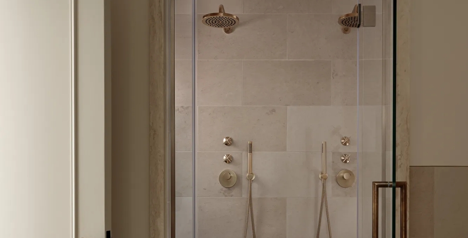 De Vere House (Victoria Road) - Bathroom with Albert II Door Knob (DK1069), Emergency Release (RL1026) & Arnold Glass Shower Door Pull Handles (BA1007) in Mid Antique Brass Waxed - MABW