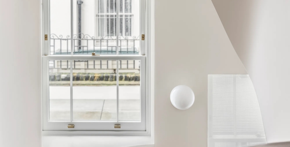 10 Hill Road - Landing with Sash Stop (WN1073), Cube Sash Lift (WN1009) & Cube Sash Fastener (WN1013) in Brushed Brass Waxed - BBW on sash window